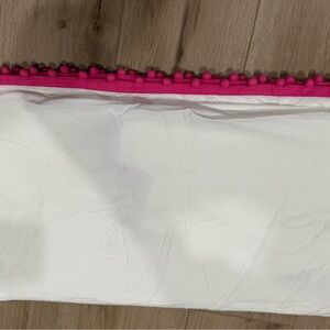 Pottery Barn Kids organic pom pom crib skirt